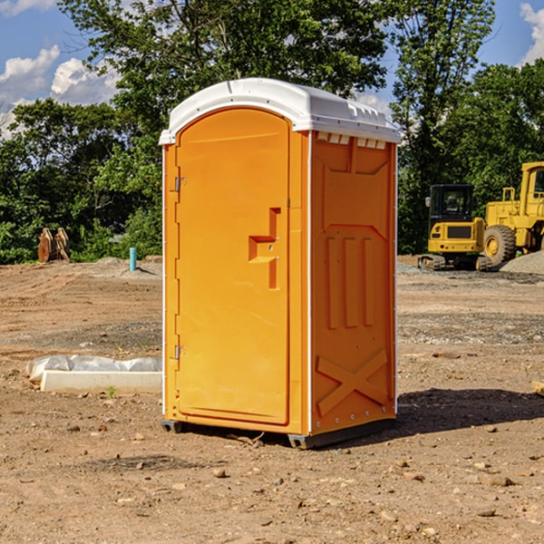 how often are the porta potties cleaned and serviced during a rental period in Russell IL